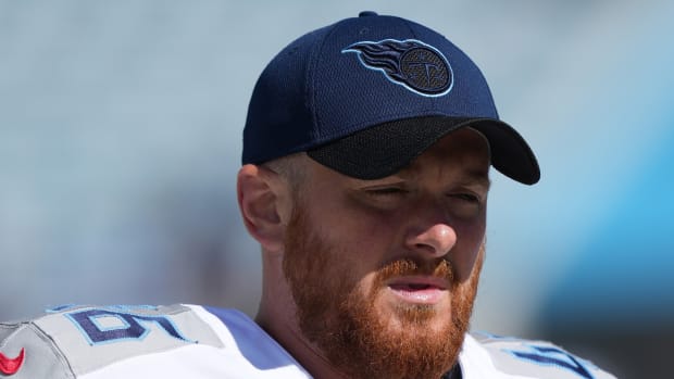 Tennessee Titans long snapper Morgan Cox (46) walks on the field prior to the game against the Jacksonville Jaguars at TIAA Bank Field.
